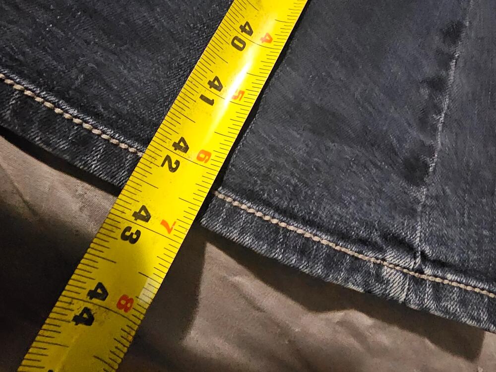 Dark wash denim jeans contrast stitching faded whiskering five pocket zip fly